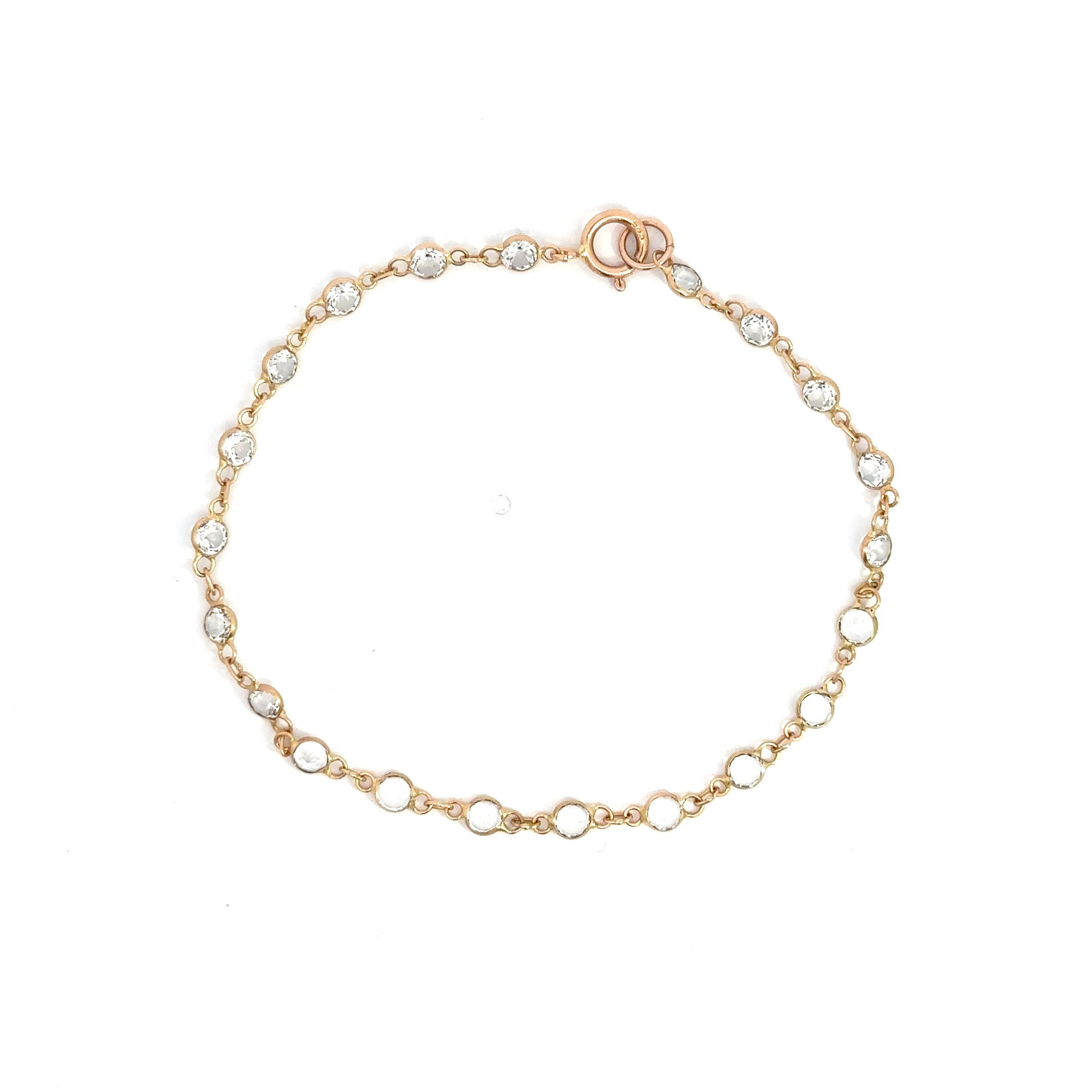 WD619 14kt gold, bezeled white topaz bracelet