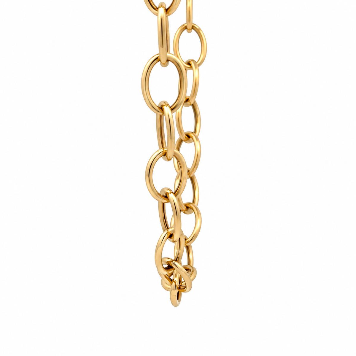 Close-up of polished 14KT yellow gold oval chain links showing the open-link design and smooth finish.