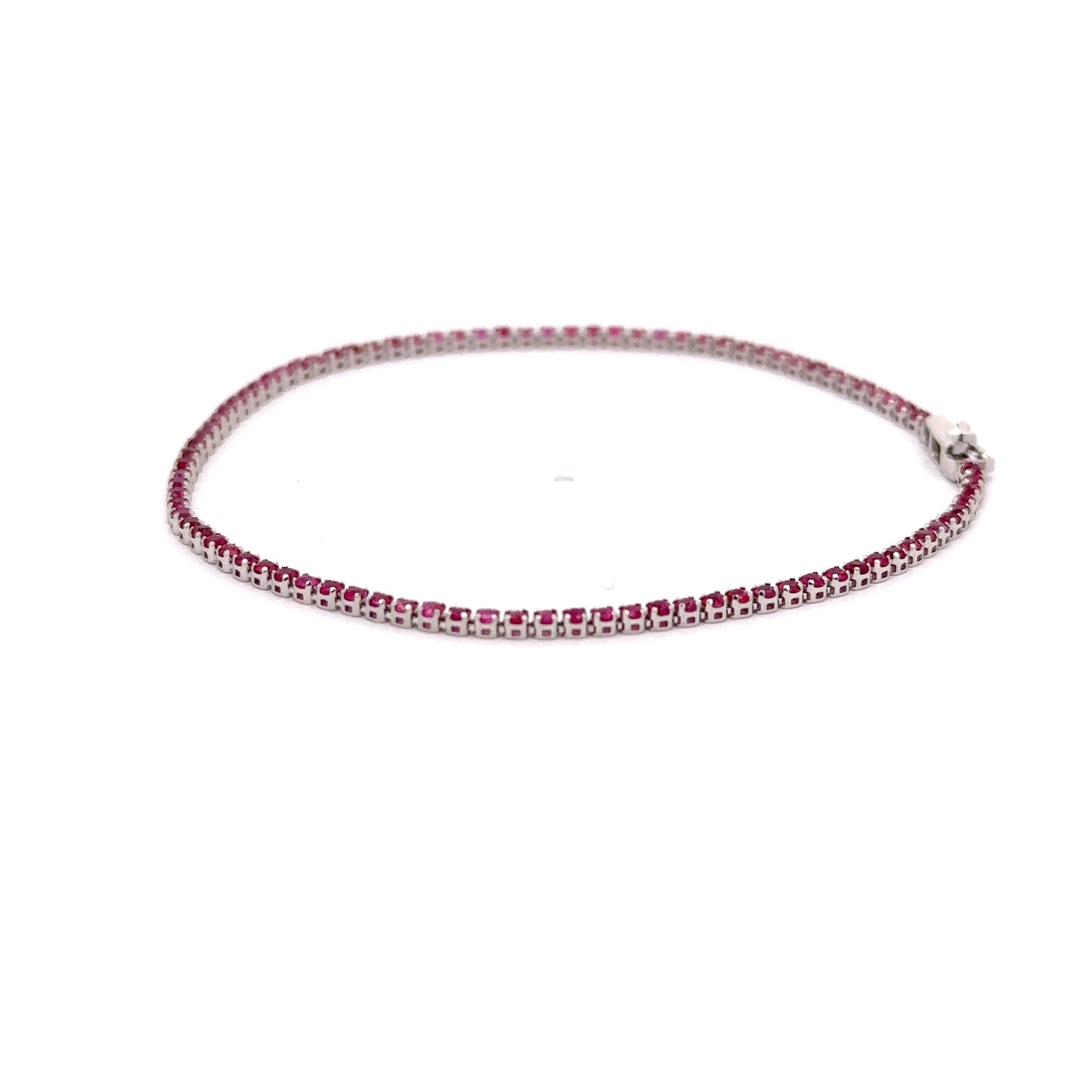 WD1204 18Kt Gold Hot Pink Sapphire Tennis Bracelet