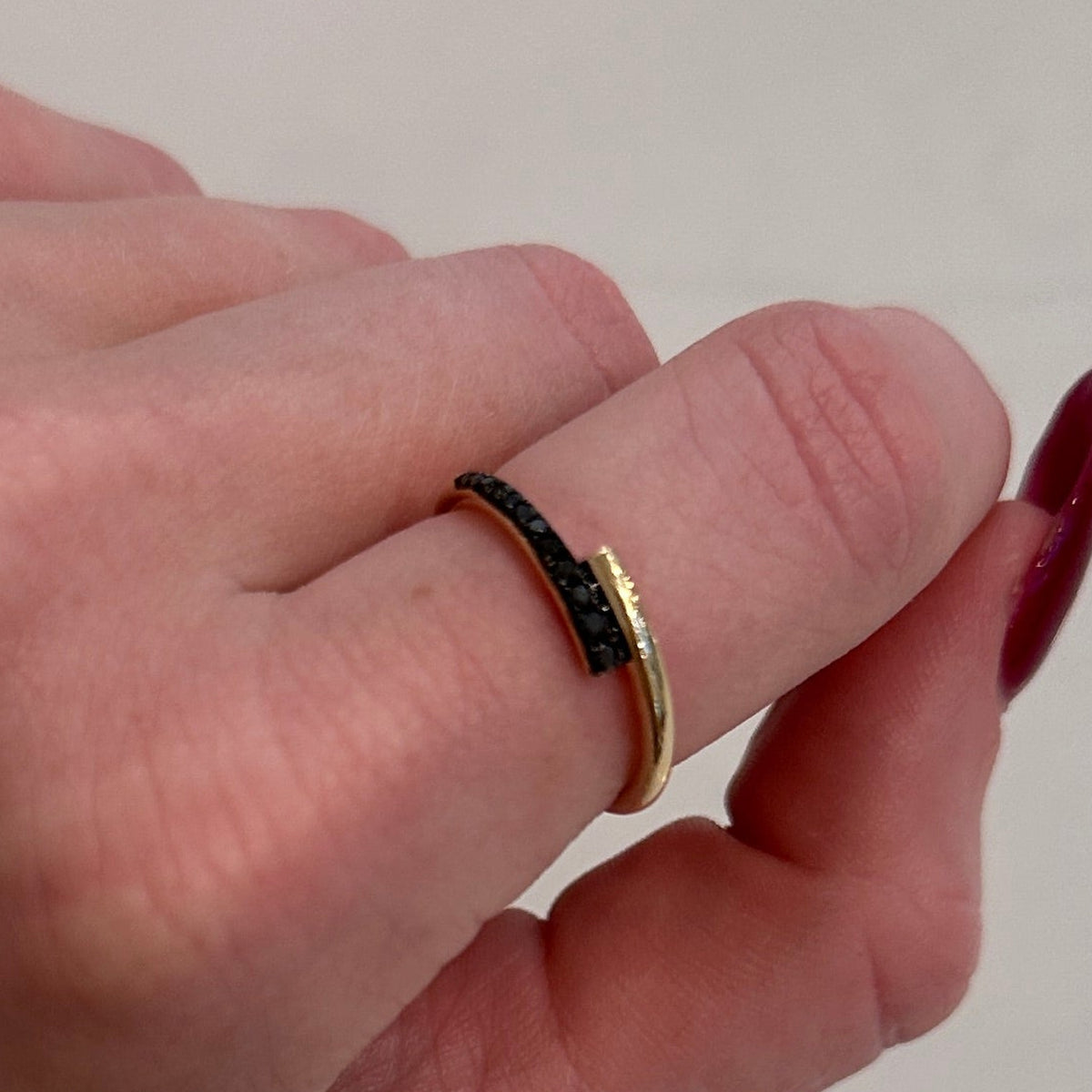 WD1259 14kt Yellow Gold Ring with Black Diamond Detail worn on hand