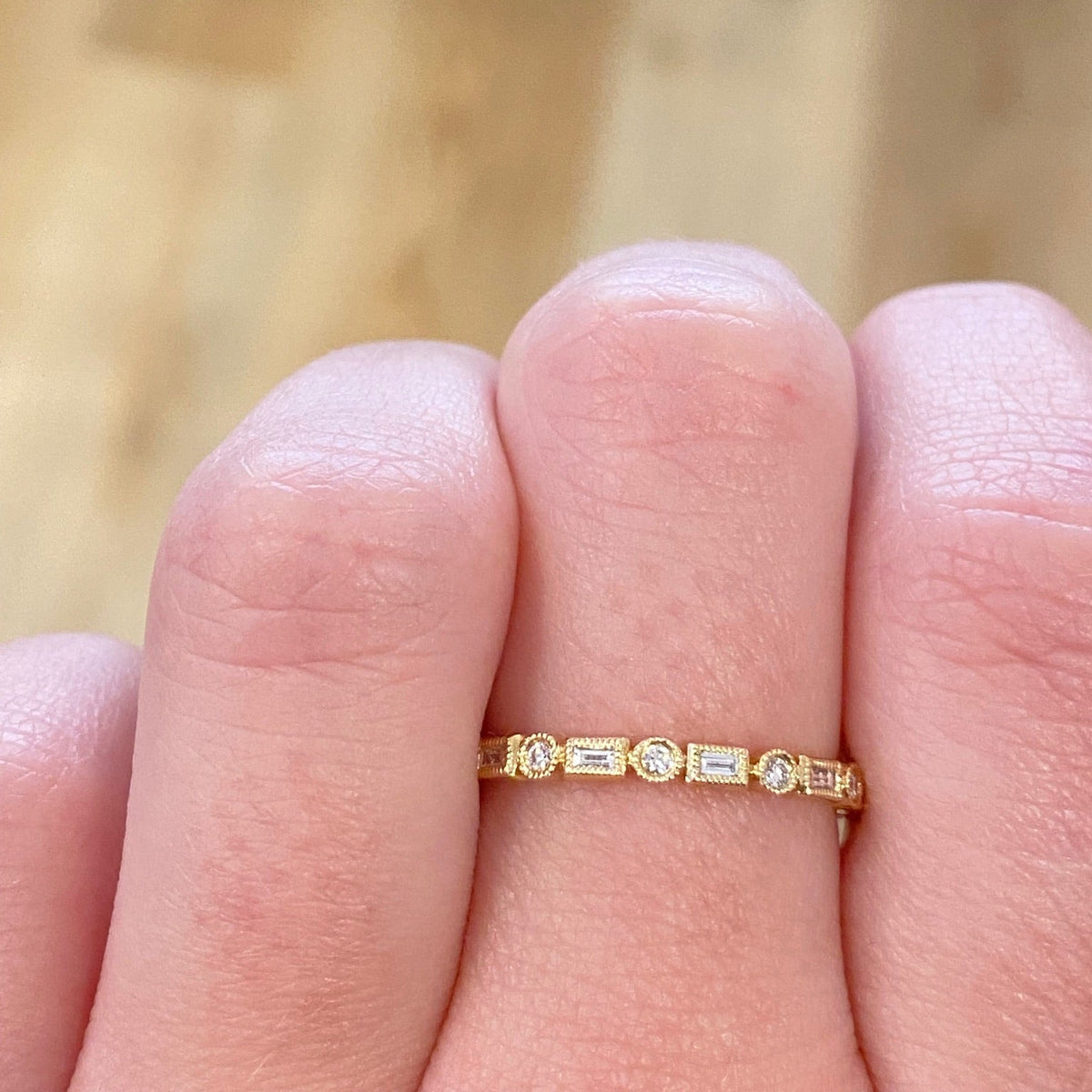 WD432 Baguette and Round Bezel Ring worn on hand