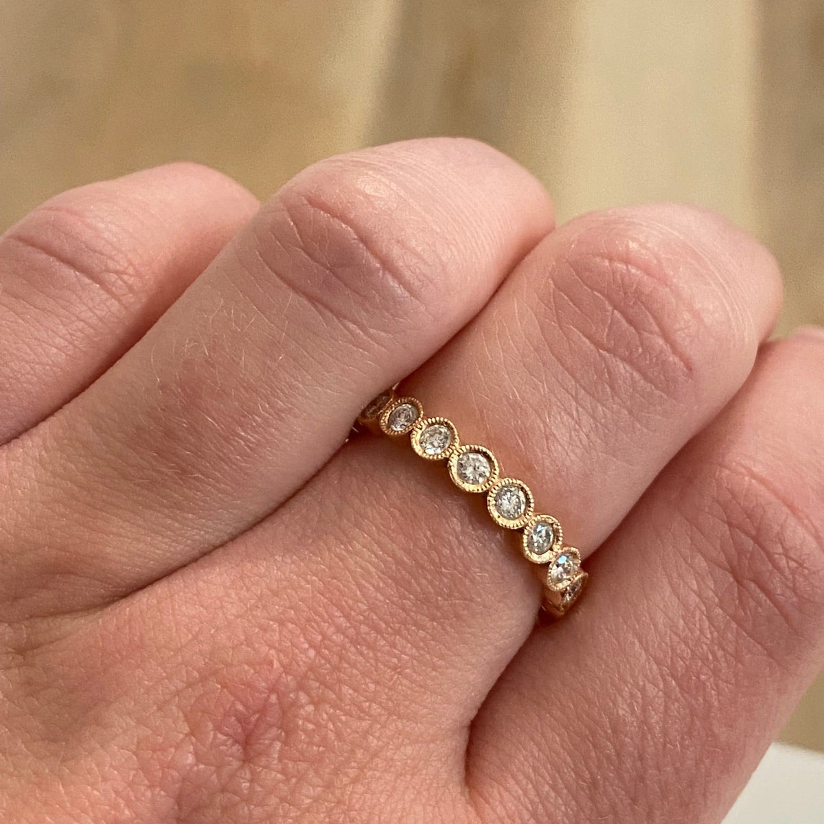 WD299 3mm Bezel Diamond Eternity Band worn on hand