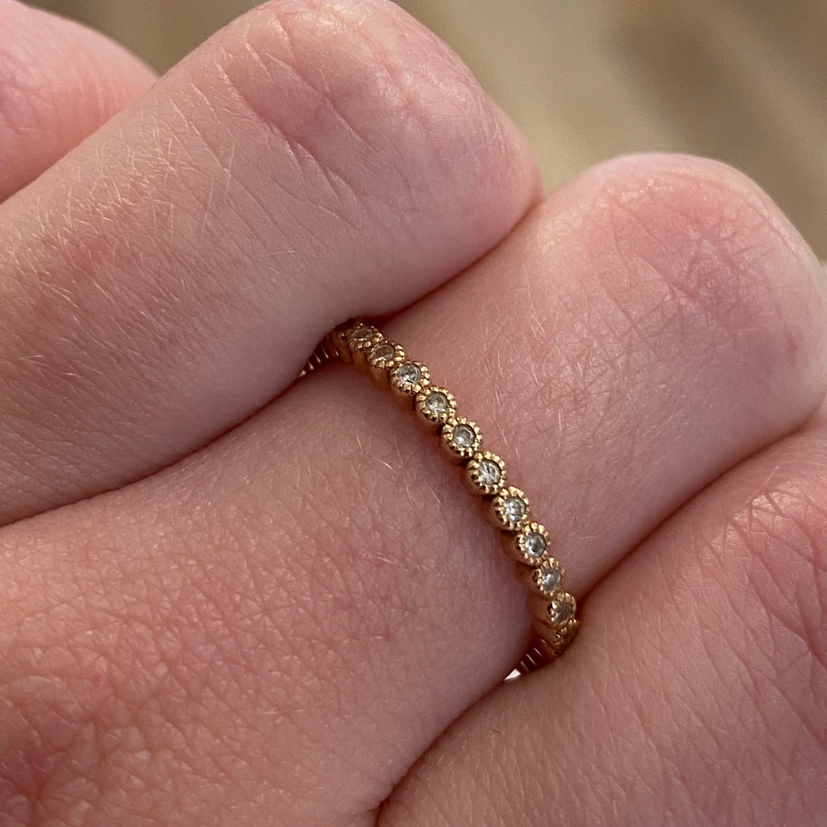 WD19 Tiny Bezel Eternity Band worn on hand