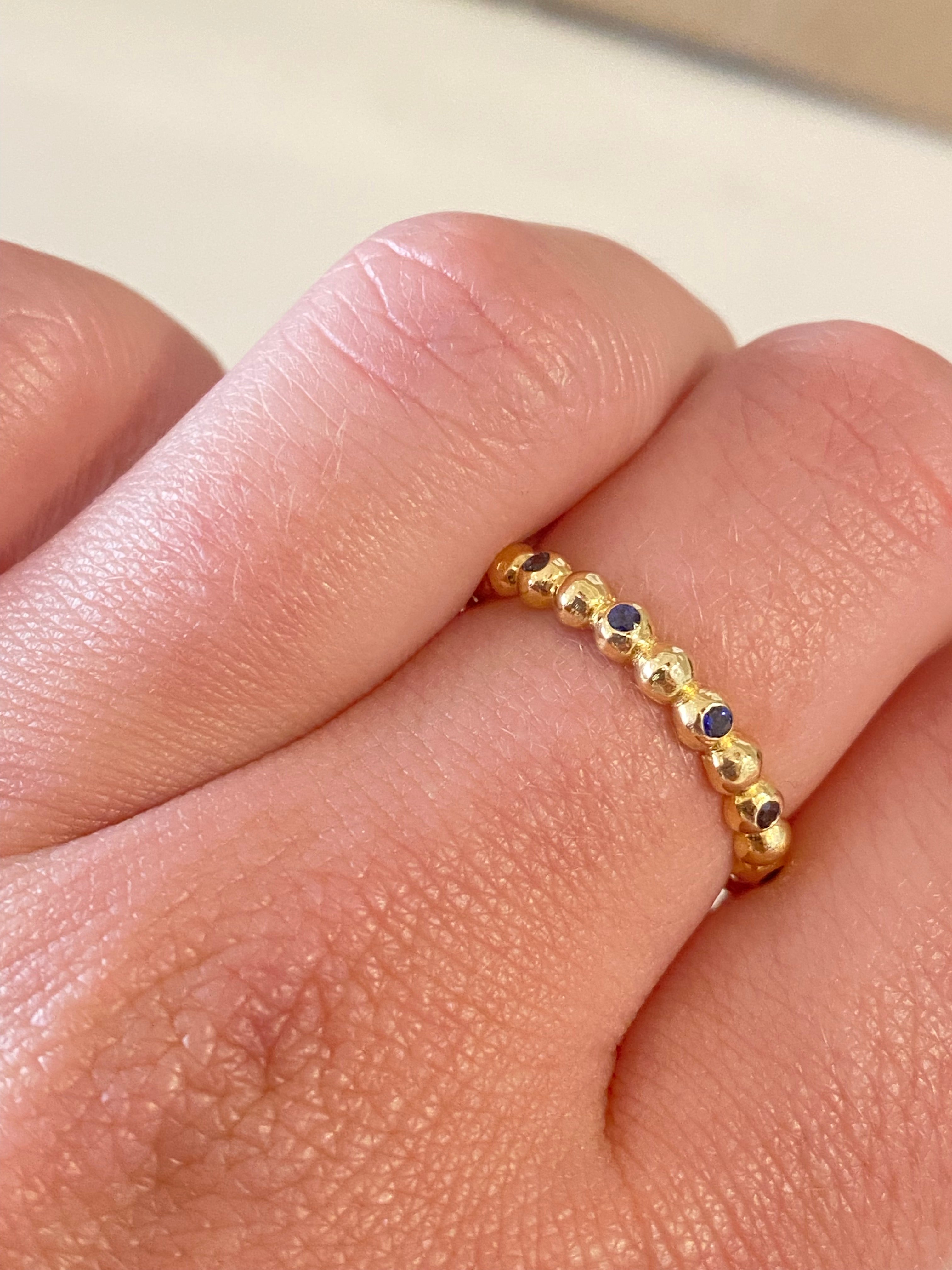 WD924 14kt gold with .22ct blue sapphire ring