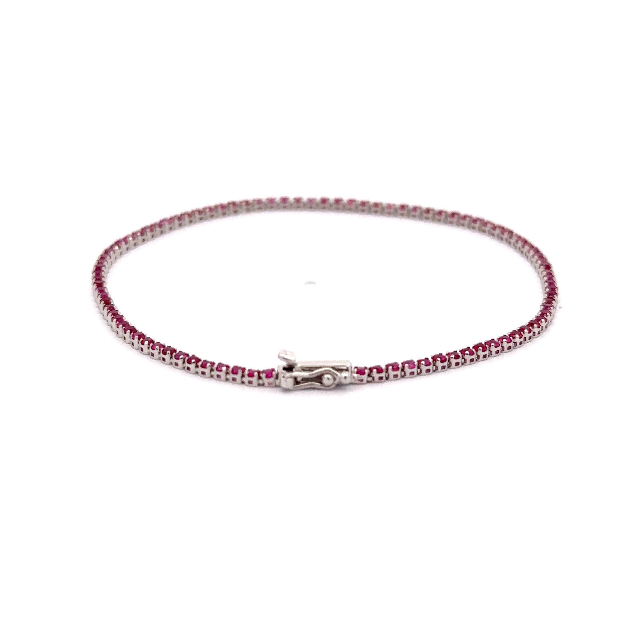 WD1204 18Kt Gold Hot Pink Sapphire Tennis Bracelet