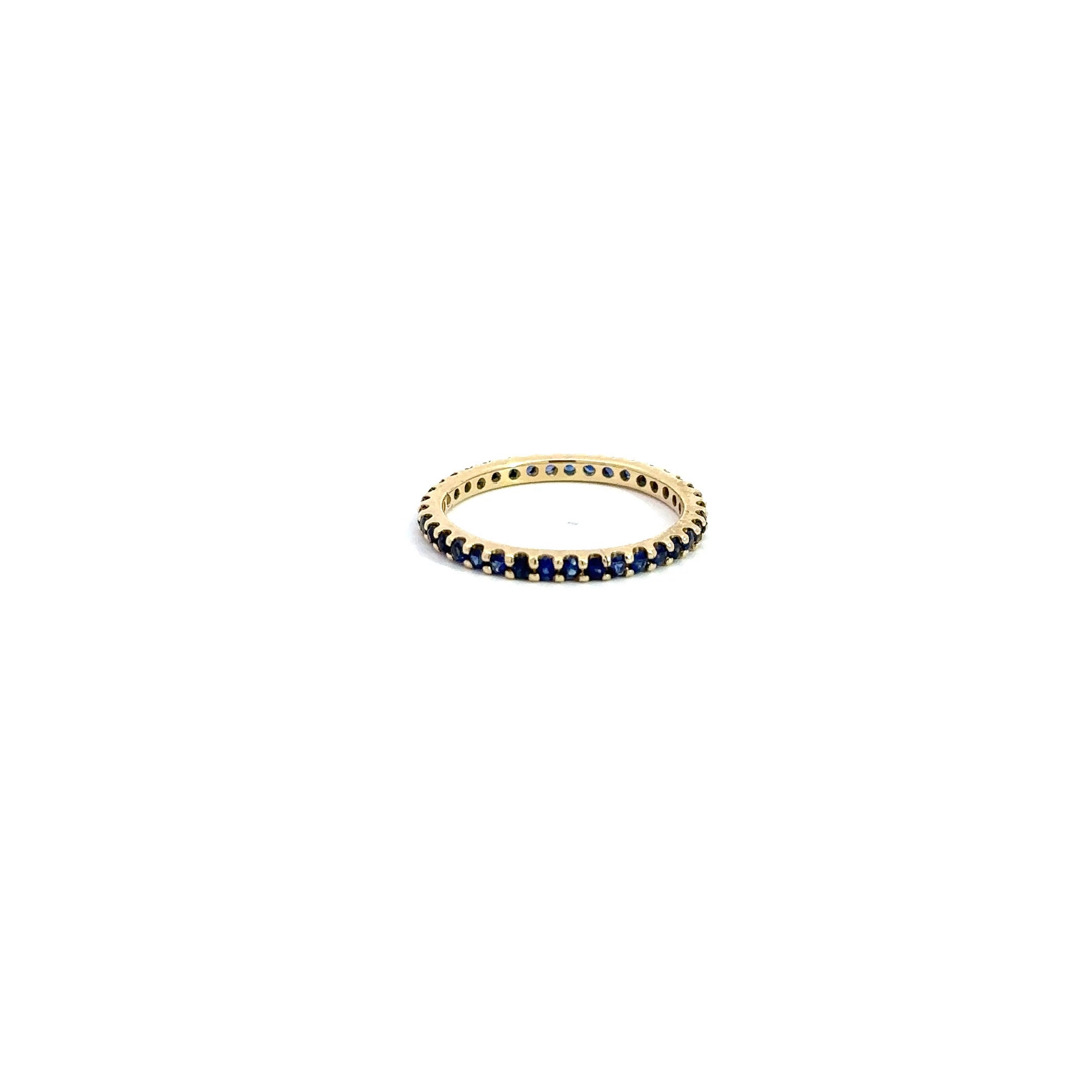 AD121BS Blue Sapphire Shared Prong Eternity Band