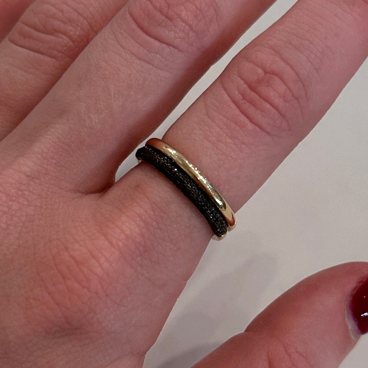 WD1254 14kt Gold Band with Pave Black Diamonds worn on hand