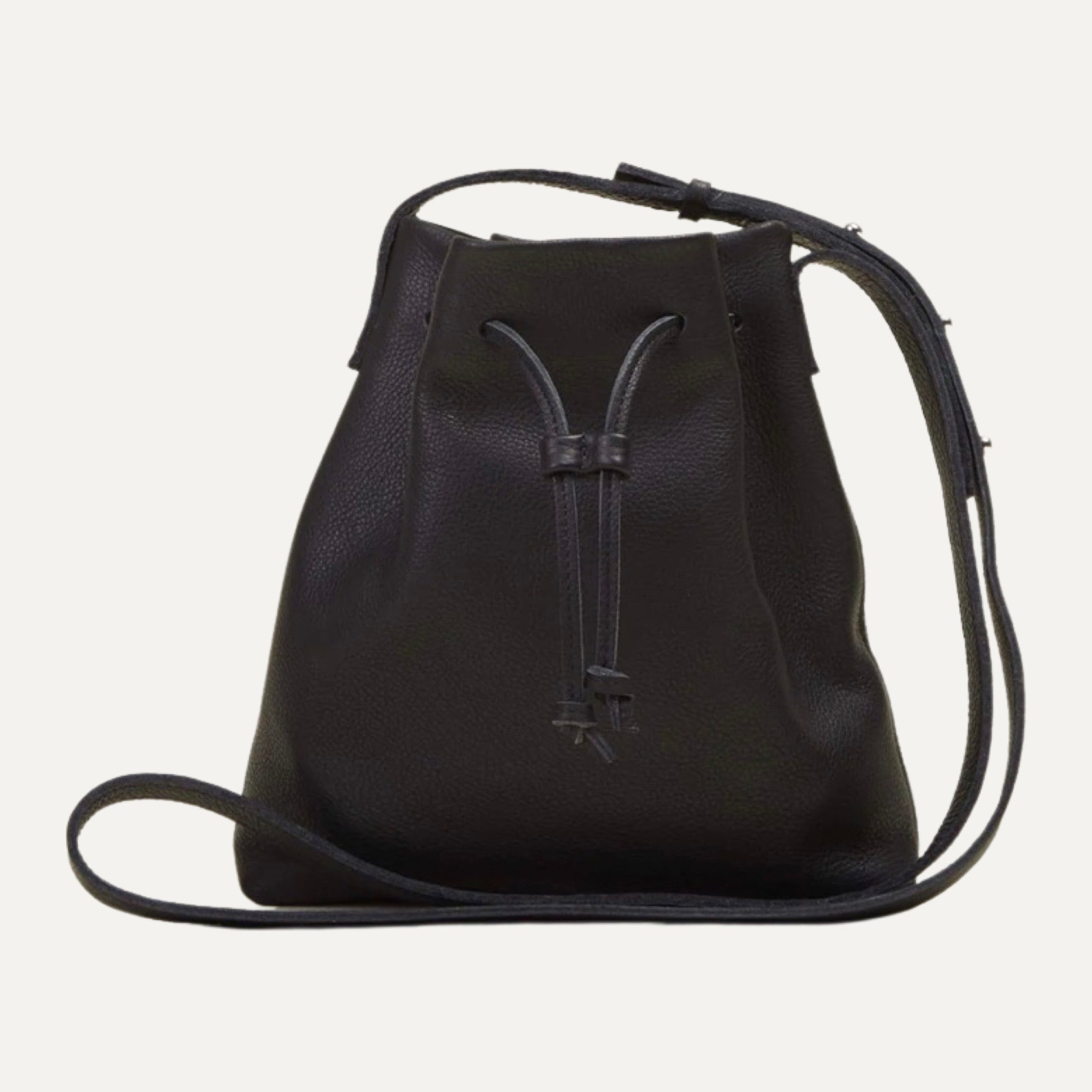 Black Mini Crossbody Tote Bag with leather drawstring closure with adjustable strap & exterior phone pocket.   California Dreamed and Stitched® Made in the USA.  SPECIFICATIONS  EXTERIOR and INTERIOR  Buttery Italian Leather interior &am