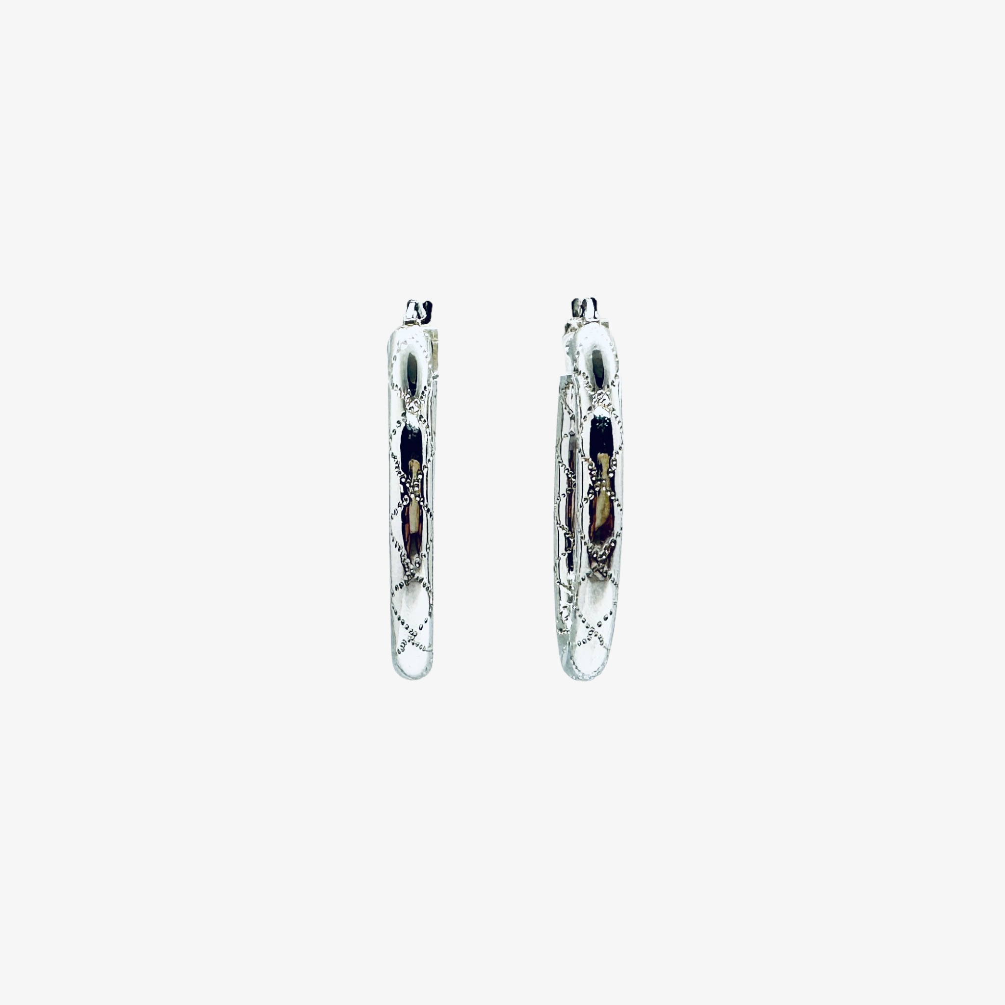 WD873 14kt gold diamond cut Oval shaped hollow hoops