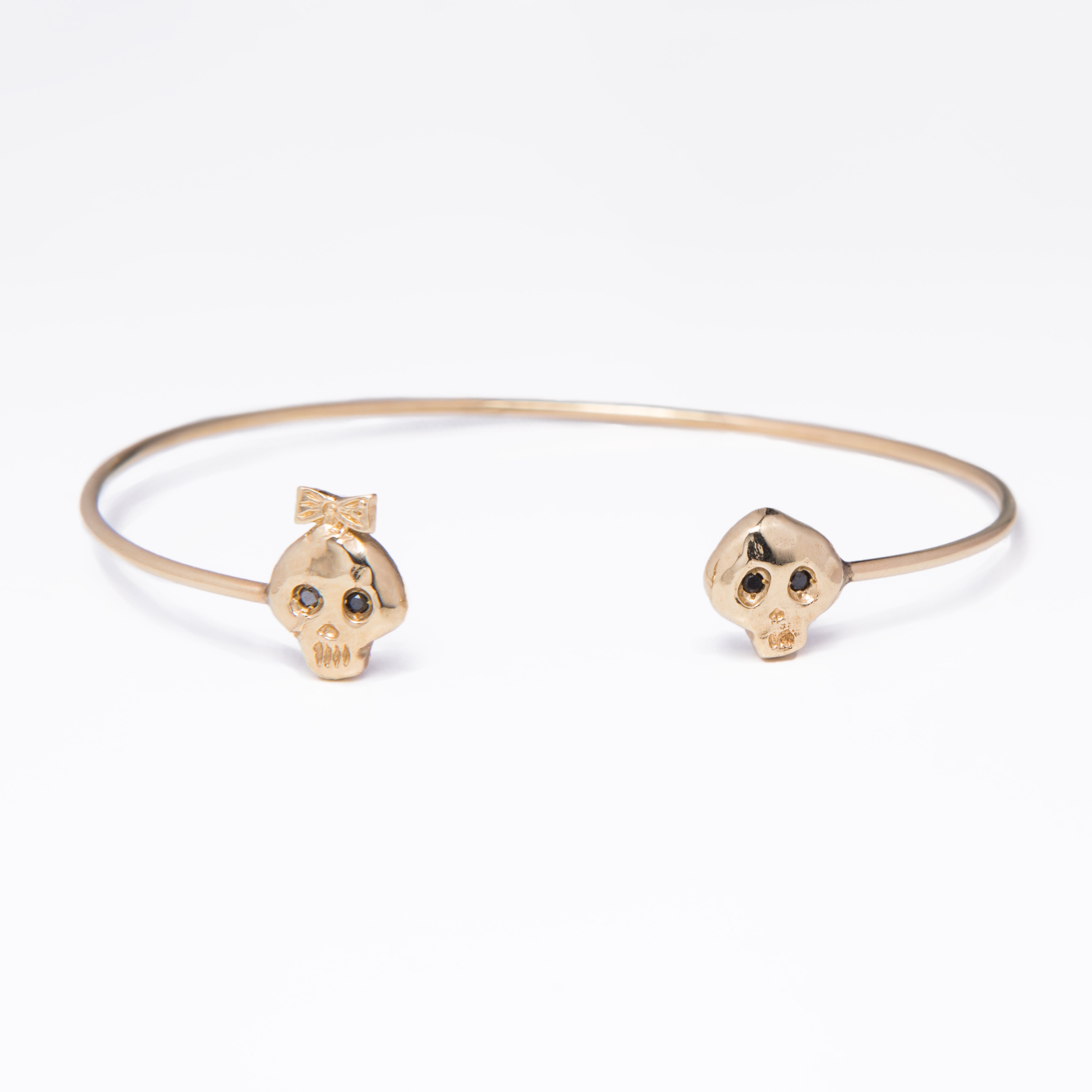 WD166 14kt gold girl and boy skull cuff